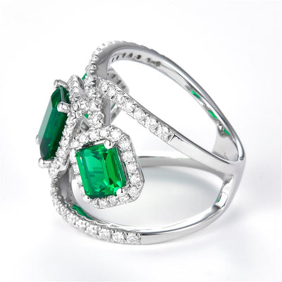 3.11 Ct. Moissanite Sterling Silver (White). Designer Ring with Simulant Emeralds Ring. (Women). Size 7.5